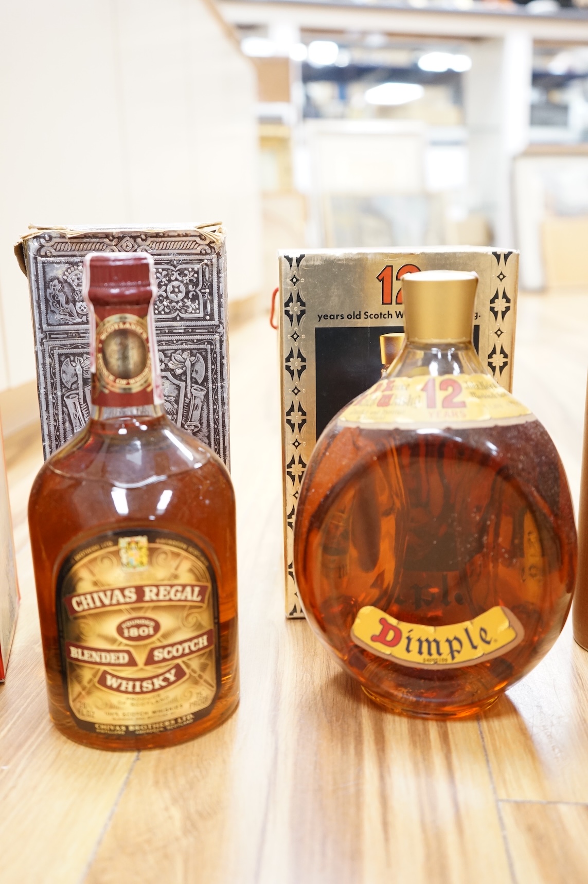 A bottle of Glenmorangie Scotch whisky and five other cased spirits